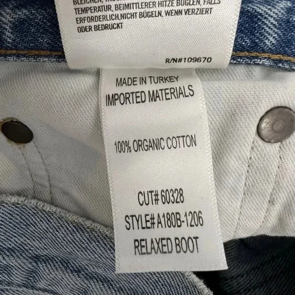 AGOLDE Mid Rise Relaxed Boot Cut Jeans in Curio Light Denim Organic Cotton 26 - Picture 12 of 14